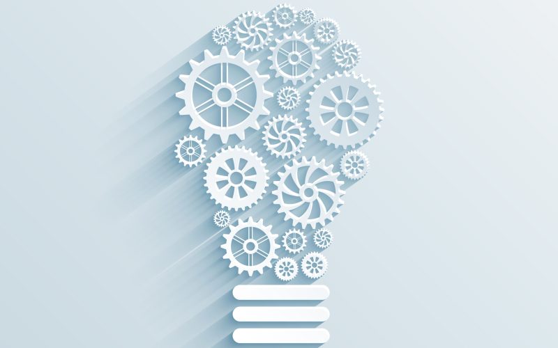 vector paper light bulb with gears and cogs, business interaction concept